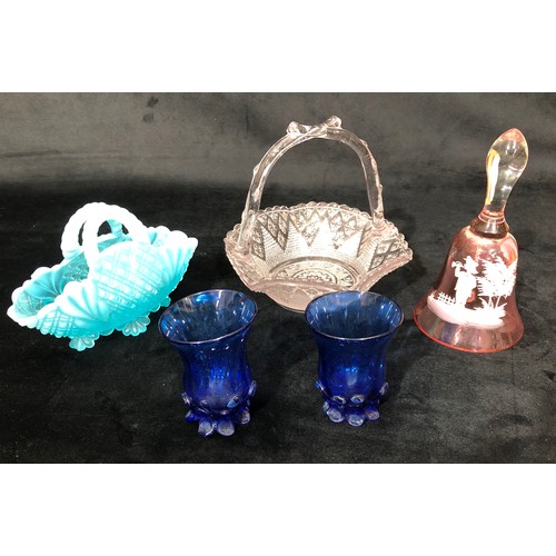 6121 - A pink tinted glass bell, 2 small glass baskets and 2 small blue glass vases. (5)