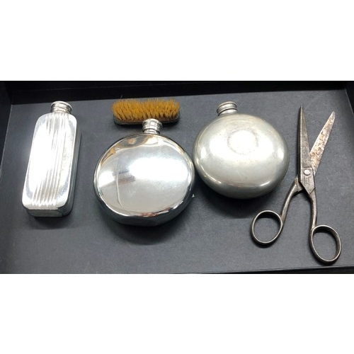 6081 - 3 small hip flasks, 1 labelled English Pewter, Sheffield, a miniature brush and a pair of scissors. ... 