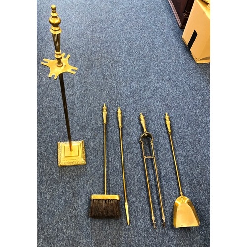 6111 - Set of brass fire irons on brass square base stand, shovel, tongs, brush and poker 75cm high. (5)