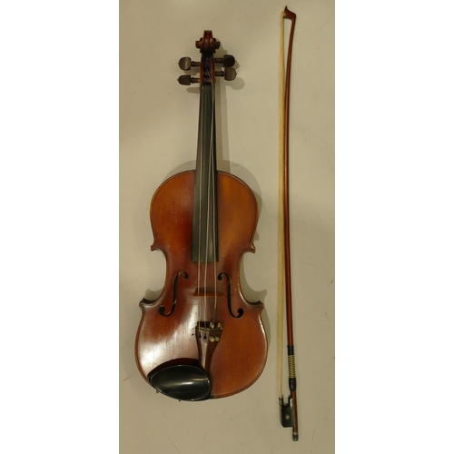 1001 - A 19th Century Staines 2-piece back violin, labelled and dated 1892, with bow and in zipped case.