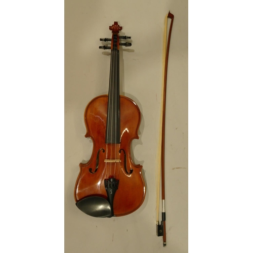 1003 - Stentor 2-piece back violin numbered R227084, back 35.5cm, with bow (needs restringing), in zipped c... 