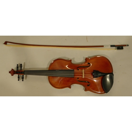 1003 - Stentor 2-piece back violin numbered R227084, back 35.5cm, with bow (needs restringing), in zipped c... 