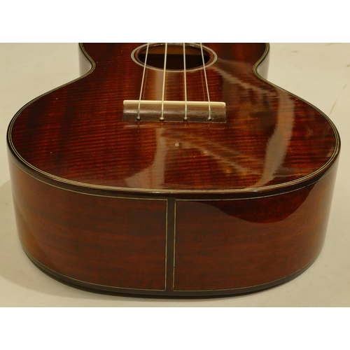 1007 - Eastman ukulele model EU3C serial number 16956769 in hard case.