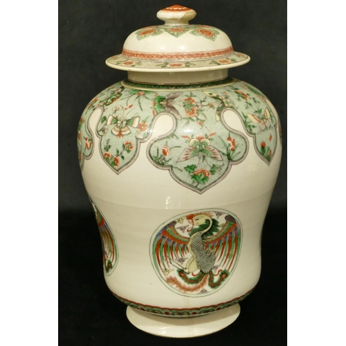 102 - An 18th/19th Century Kangxi round bulbous lidded hinged jar on white ground with multi-coloured butt... 