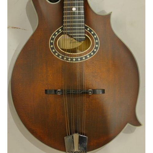 An Eastman 8string mandolin with Mother of Pearl inlay to fretwork, model md314, serial number 1395
