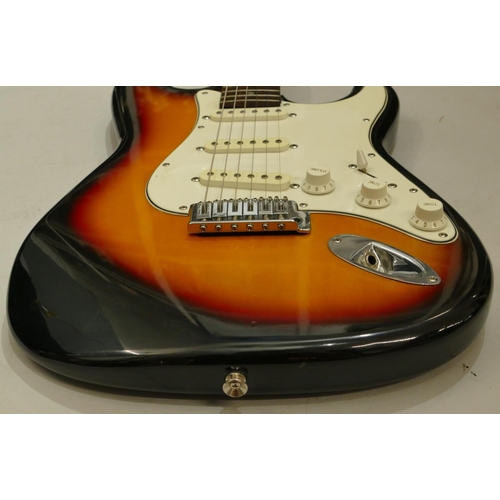 1076 - Squire Strat by Fender 6-string electric guitar, overall length 99cm.