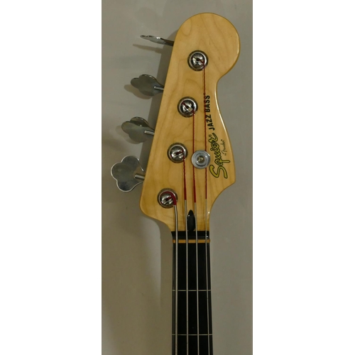 1077 - Squire by Fender jazz bass 4-string bass guitar numbered s/nICS17041427, overall length 118cm.