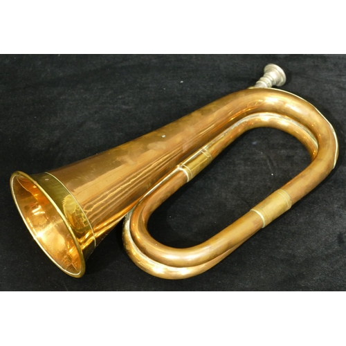 1095 - A brass and copper bugle, 30.5cm long