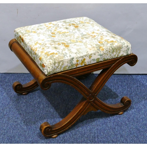 1151 - A Victorian mahogany square stool with floral drop in seat on splayed X-shaped legs and centre stret... 