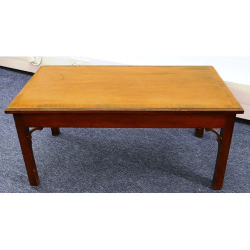 1154 - A mahogany rectangular shaped coffee table with banded top, brush slides to each end on square chamf... 