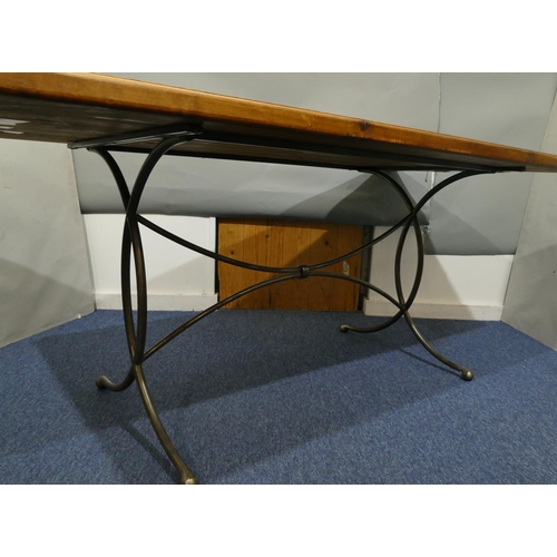 1167 - A good quality wrought iron dining room suite, dining table with pine rectangular shaped top on wrou... 