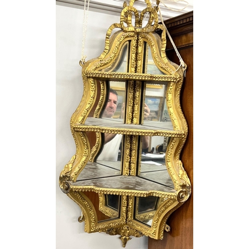 1171 - A 19th Century gilt hanging corner mirrored 3 tier shelf 43cm wide 92cm high