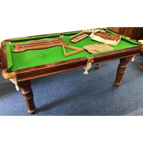 1173 - EJ Riley mahogany snooker dining table with 4 extra leaves, on round turned fluted legs, with score ... 