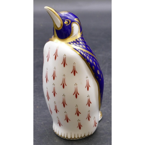 153 - A Royal Crown Derby Imari pattern figure in form of penguin with gold stopper, 14cm high.