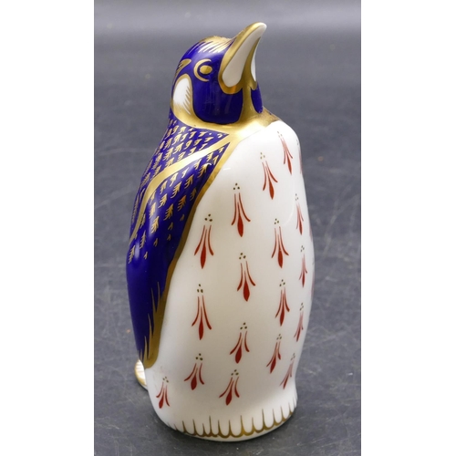 153 - A Royal Crown Derby Imari pattern figure in form of penguin with gold stopper, 14cm high.