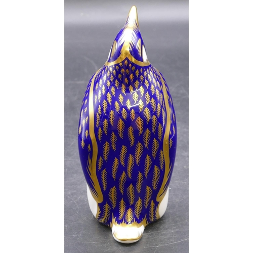 153 - A Royal Crown Derby Imari pattern figure in form of penguin with gold stopper, 14cm high.