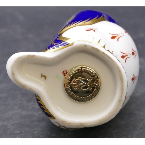 153 - A Royal Crown Derby Imari pattern figure in form of penguin with gold stopper, 14cm high.