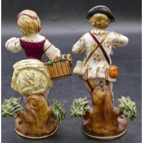 157 - A pair of 18th Century Derby figurines of a young gentleman and lady with encrusted flowers and garl... 