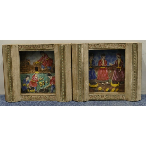 159 - A pair of early coloured tiles with raised figure decoration, mounted in frames inset with lamps, 28... 