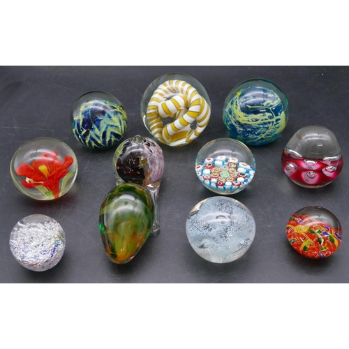 164 - 2 Modena glass paperweights, 2 millefiori glass paperweights, a glass paperweight indistinctly signe... 