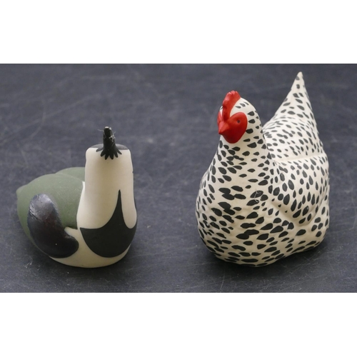 166 - A Highbank china figure of a hen with white and black spotted decoration, 8cm high and a similar fig... 