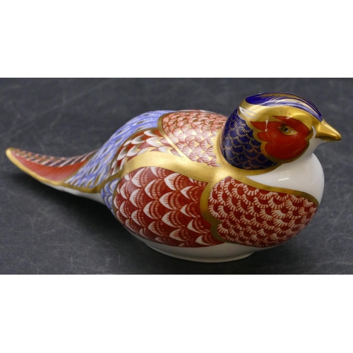 171 - A Royal Crown Derby Imari patterned paperweight in the form of a bird, 17.5cm long