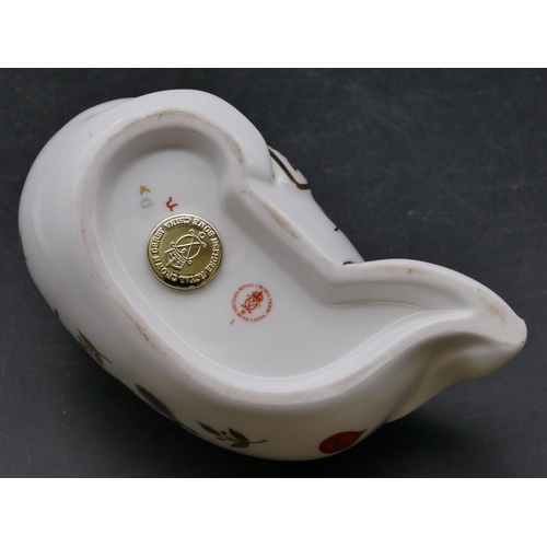 173 - A Royal Crown Derby paperweight in the form of a seal, 13cm long