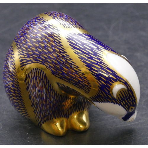 175 - A Royal Crown Derby paperweight in the form of a badger (no stopper), 8cm high