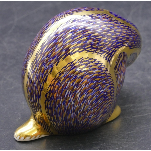 175 - A Royal Crown Derby paperweight in the form of a badger (no stopper), 8cm high