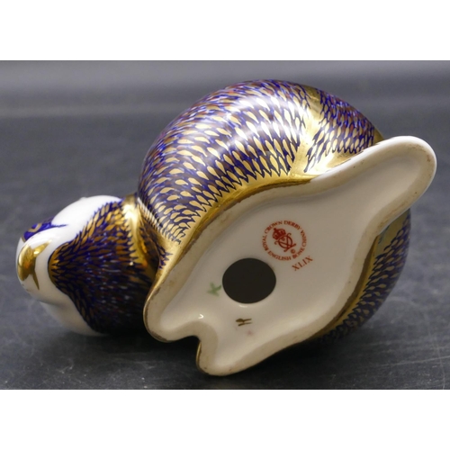 175 - A Royal Crown Derby paperweight in the form of a badger (no stopper), 8cm high