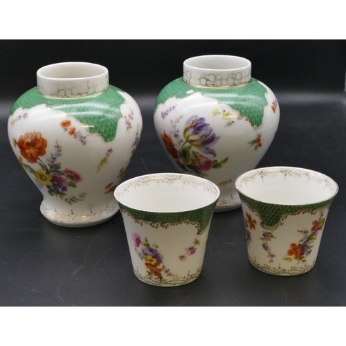 181 - A pair of Continental Dresden style small round bulbous thin necked vases on white and green ground ... 