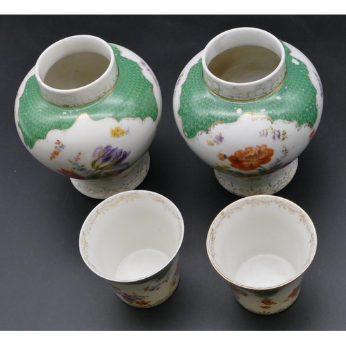 181 - A pair of Continental Dresden style small round bulbous thin necked vases on white and green ground ... 