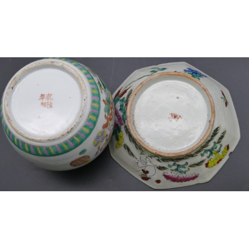 185 - An Oriental octagonal shallow bowl on white and green ground with multi-coloured floral and leaf dec... 