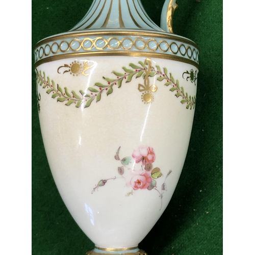 192 - A Royal Crown Derby small round bulbous thin necked ewer on turquoise and cream ground with hand pai... 