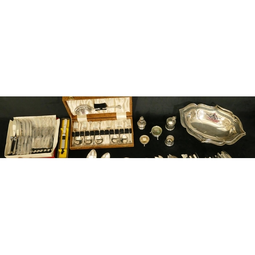 242 - A large quantity of various odd silver plated flatware, a plated cake basket and 5 plated condiments