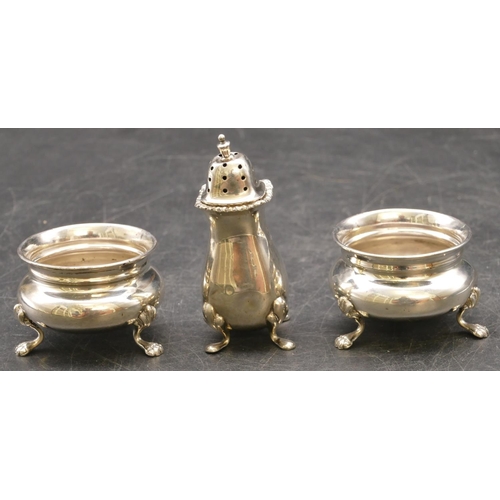 256 - A pair of Birmingham silver round bulbous shaped salts (no liners) on splayed legs with claw feet an... 