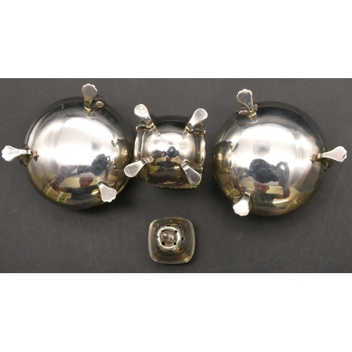 256 - A pair of Birmingham silver round bulbous shaped salts (no liners) on splayed legs with claw feet an... 