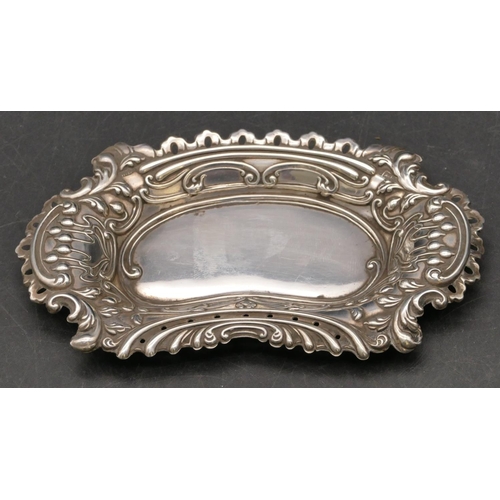 258 - A Birmingham silver scallop shaped pin dish with embossed floral and leaf decoration, 12.5cm wide, 0... 