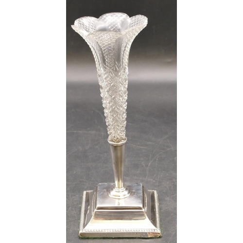 260 - A cut glass round trumpet shaped spill vase on Sheffield silver stand with square splayed base, 20.5... 