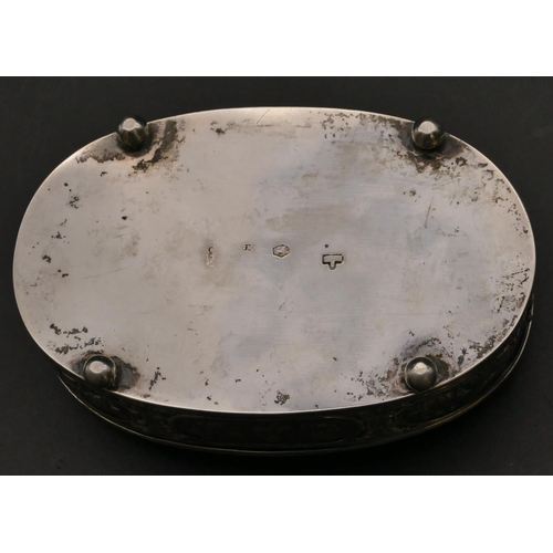 264 - A Continental oval silver coloured metal trinket box with hinged lid, allover embossed figures in bo... 