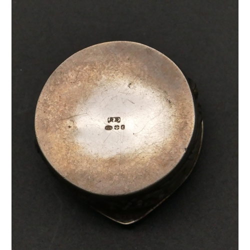 277 - A modern 925 silver round pill box with hinged lid and embossed floral and scroll decoration, 3.5cm ... 