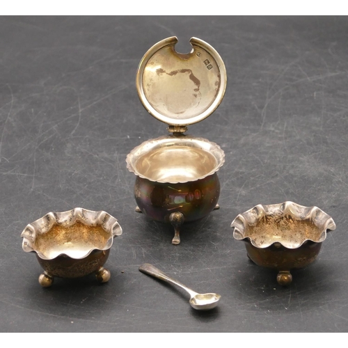 280 - A pair of Birmingham silver round bulbous trumpet shaped salts with crinkled rims on ball feet and a... 