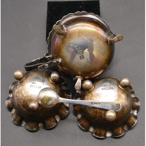 280 - A pair of Birmingham silver round bulbous trumpet shaped salts with crinkled rims on ball feet and a... 