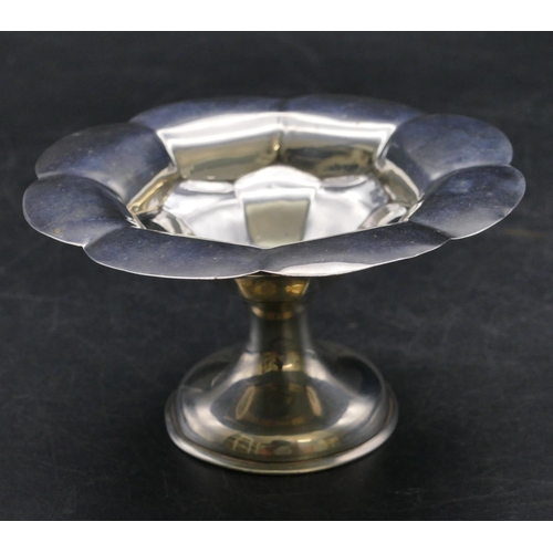 337 - A Birmingham silver round scallop shaped small sweetmeat dish on sweeping base, 11cm diameter, 1.6oz... 