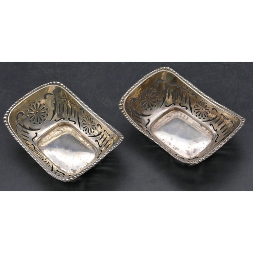 340 - A pair of Birmingham silver rectangular shaped sweetmeat dishes with ball rims and pierced galleries... 