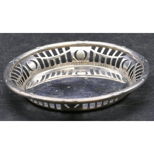 343 - A London silver small round dish with pierced gallery 