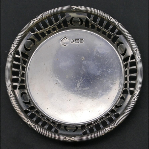 343 - A London silver small round dish with pierced gallery 