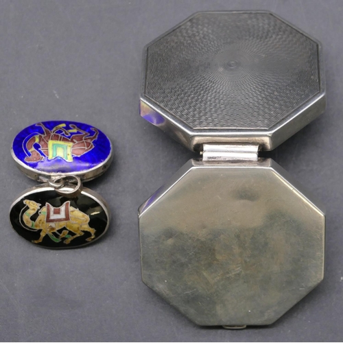 350 - A Birmingham silver octagonal shaped pill box with engine turned hinged lid and a silver-coloured me... 