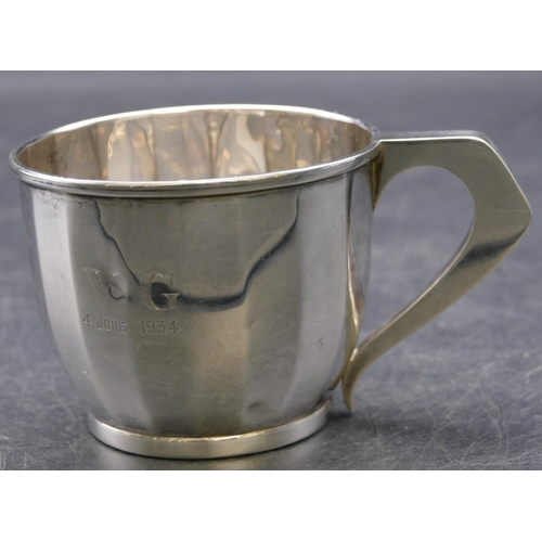 359 - A Birmingham silver christening mug with chamfer decoration, makers mark D & F, 2.4oz.