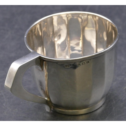 359 - A Birmingham silver christening mug with chamfer decoration, makers mark D & F, 2.4oz.